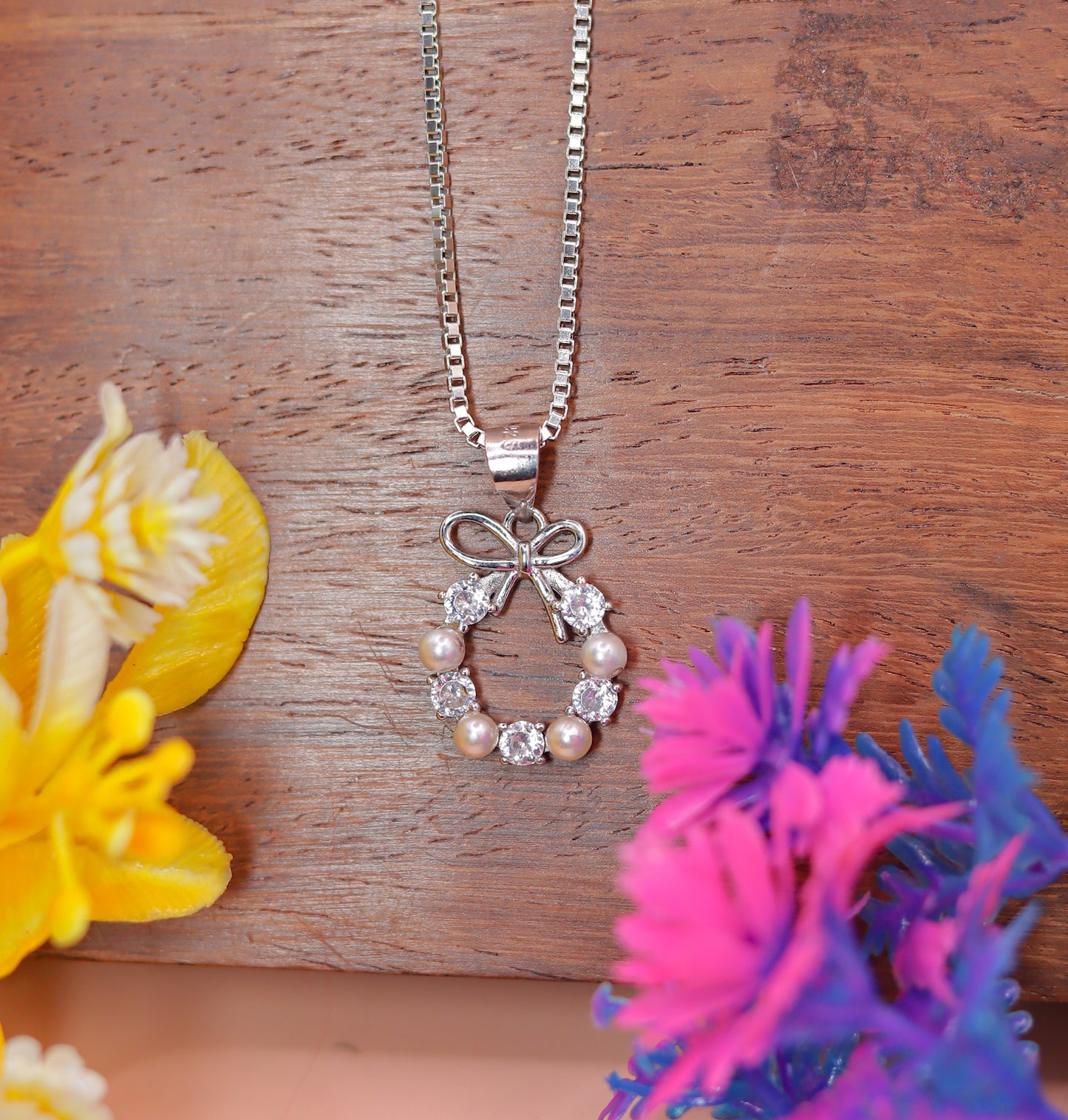 Elegant Bow Circle Pendant in 925 Sterling Silver