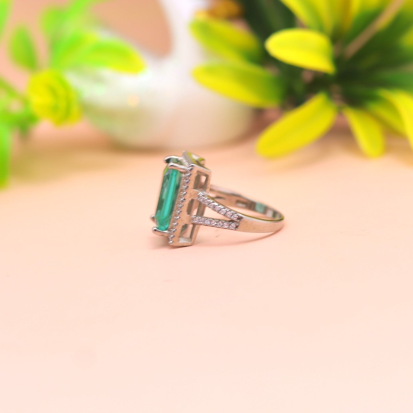 Emerald Radiance Halo Silver Ring