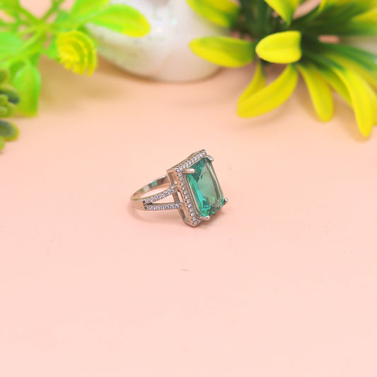 Emerald Radiance Halo Silver Ring