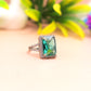 Emerald Radiance Halo Silver Ring