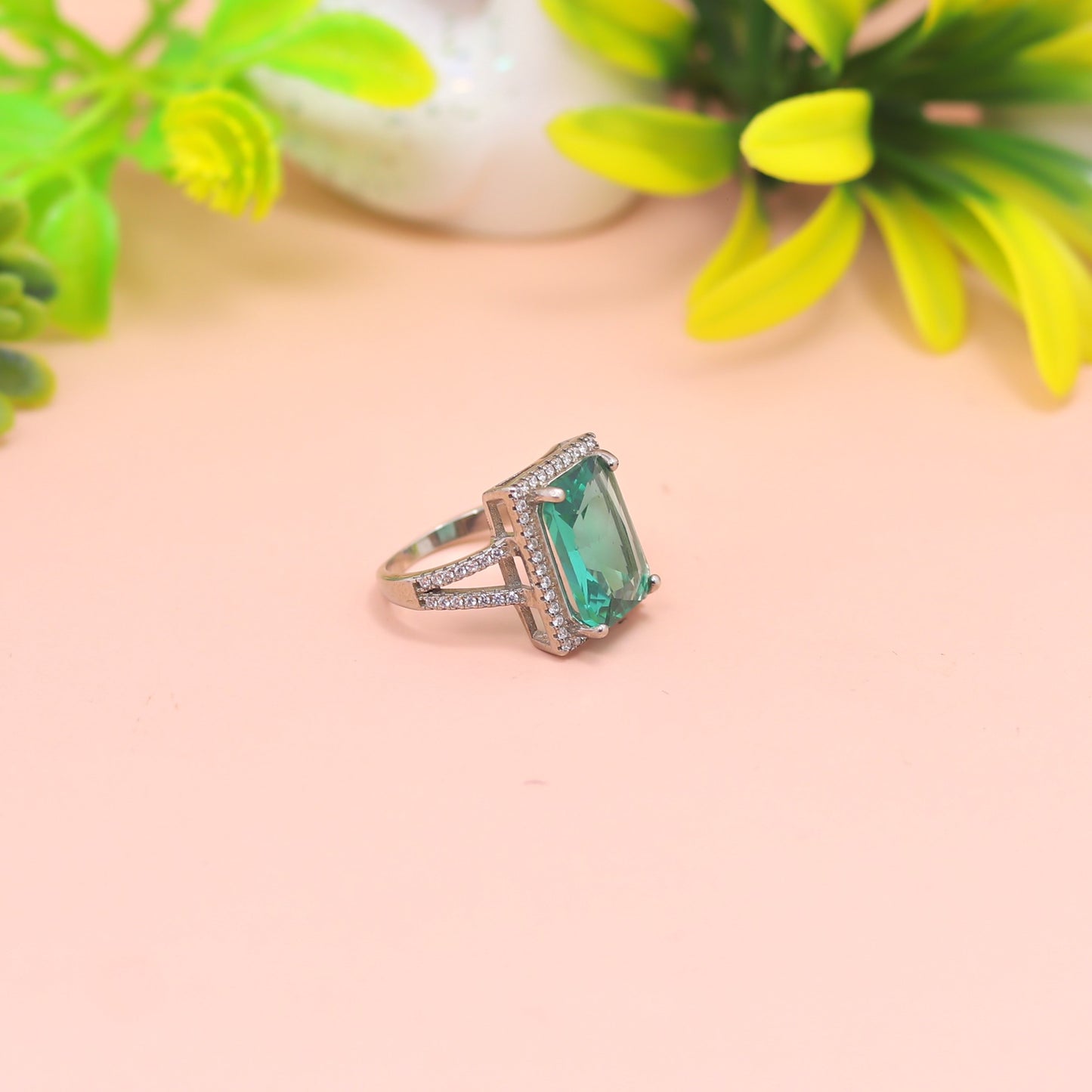 Emerald Radiance Halo Silver Ring