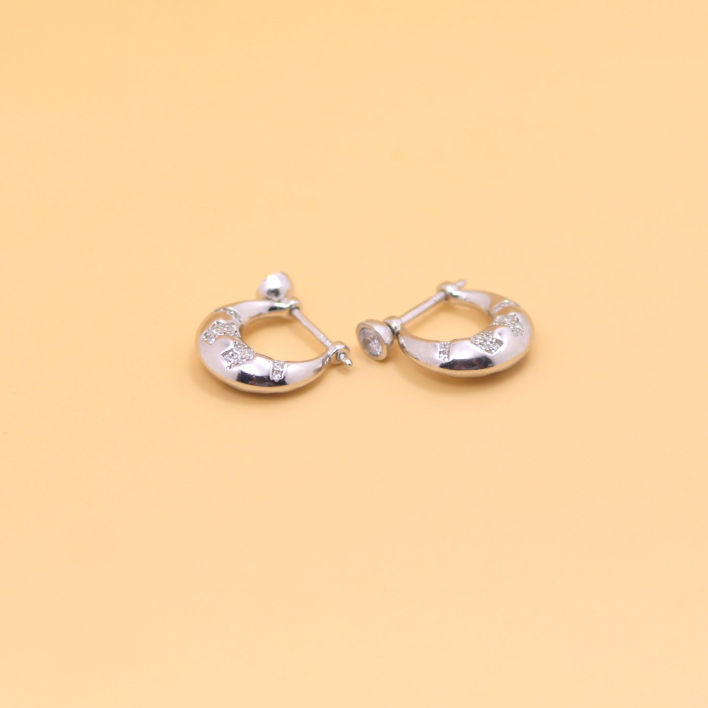 Elegant Silver Hoop Earrings with Stone Detailing