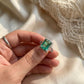 Emerald Radiance Halo Silver Ring