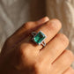 Emerald Radiance Halo Silver Ring