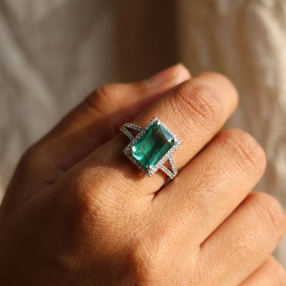 Emerald Radiance Halo Silver Ring